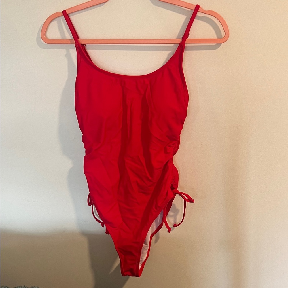 Never been worn Womens Red One-Piece Swim Suit with Side Tie Detail
